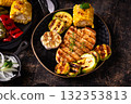Assortment of grilled bbq meat and vegetables 132353813