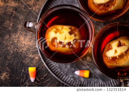 Haloween spicy apple cider drink Haloween spicy apple cider drink 132353814