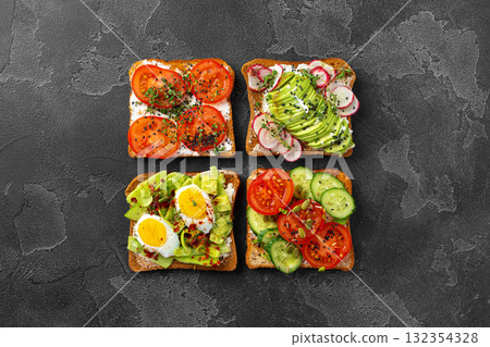 Assortment of vegan sandwiches with avocado and tomatoes Assortment of vegan sandwiches with avocado and tomatoes 132354328