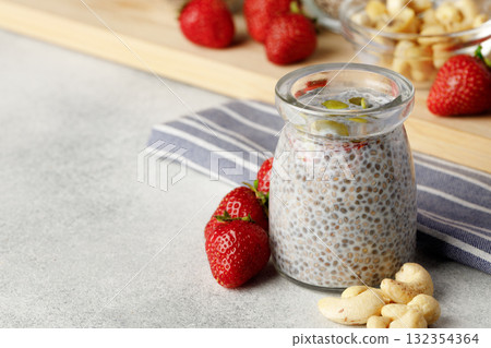 Bowl of chia pudding with fresh strawberries Bowl of chia pudding with fresh strawberries 132354364