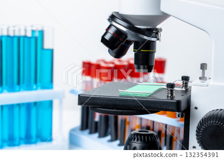 Microscope with test tubes for research close up 132354391