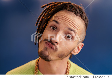 Portrait of a happy positive guy with dreadlocks 132354393