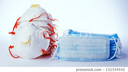 Face mask protection and medical surgical masks on white background Face mask protection and medical surgical masks on white background 132354542