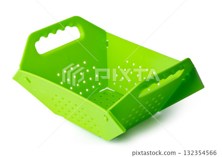 New plastic kitchen colander isolated on white New plastic kitchen colander isolated on white 132354566