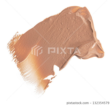 Smudged stain of a cream foundation isolated on white Smudged stain of a cream foundation isolated on white 132354579