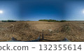 Seamless spherical 360-degree HDRI panorama of field. 360 degree panorama of a field with rows of mown wheat, hills, and forest on the horizon 132355614