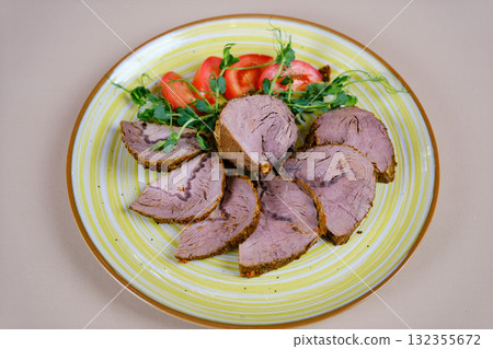 Slicing cooked meat Chef slicing freshly grilled juicy beef steak meat with a knife on a wooden cutting board in the kitchen, food close-up zoom in 132355672