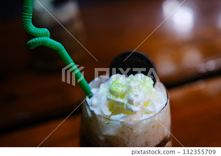 Biscoff coffee with ingredients , whipped cream, cookies spread on white background.Large image for banner 132355709