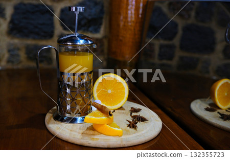 Ginger and Turmeric Lemonade, Healthy Beverage with Turmeric and Spices, Jamu Juice, Immunity Booster Drink on Bright Grey Background Ginger and Turmeric Lemonade, Healthy Beverage with Turmeric and Spices, Jamu Juice, Immunity Booster Drink on Bright Grey Background 132355723