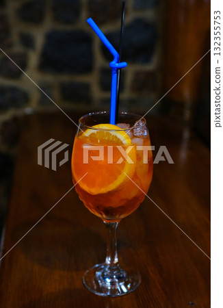 Glass of Aperol spritz cocktail isolated on white background. Top view 132355753