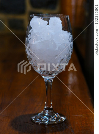 Mineral water bottle isolated on white background with clipping path. Drink water, soda and ice cubes with bubble. Splash of natural minerals water in a glass. Ice blocks, Soft drinks , Drinking soda 132355801