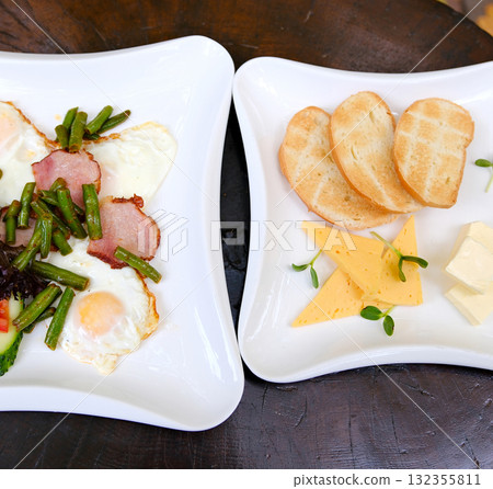 Homemade American Scrambled Egg Breakfast with Bacon and Toast Homemade American Scrambled Egg Breakfast with Bacon and Toast 132355811