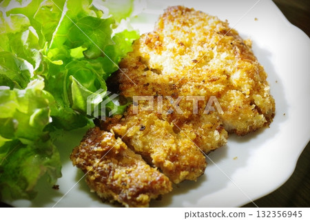 Pork cutlet served on a plate Pork cutlet served on a plate 132356945