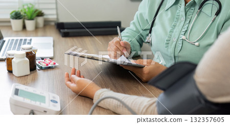 Healthcare and Patient Care. A healthcare professional conducting a check-up with a patient. Healthcare and Patient Care. A healthcare professional conducting a check-up with a patient. 132357605