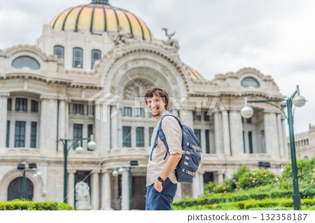 Male tourist standing in front of Palacio de Bellas Artes in Mexico City, highlighting travel, architecture, and cultural heritage. Urban tourism and exploration concept Male tourist standing in front of Palacio de Bellas Artes in Mexico City, highlighting travel, architecture, and cultural heritage. Urban tourism and exploration concept 132358187