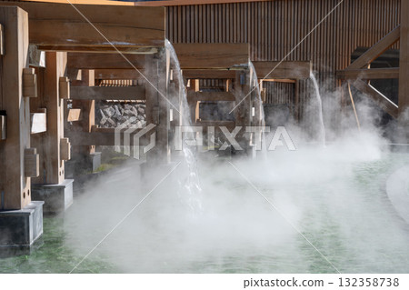 Kusatsu Onsen: Steam rising from the footbath at Onsenmon 132358738