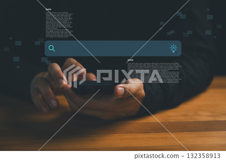 Person using smartphone with AI search bar. Technology concept of artificial intelligence in daily life, social media, big data analysis and smart technology innovation for digital solutions. 132358913