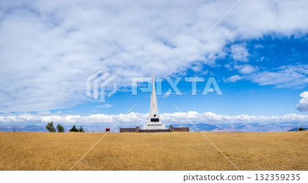 Commemorative obelisk that represents the Battle of Ayacucho in the Pampa de la Quinoa. Panoramic 132359235