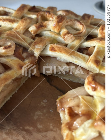 Homemade Apple Pie with fresh apples on white kitchen table, top view, flat lay. Thanksgiving traditional dessert, Thanksgiving tart preparation, autumn bakery. Crispy weather sweets. Recipe Homemade Apple Pie with fresh apples on white kitchen table, top view, flat lay. Thanksgiving traditional dessert, Thanksgiving tart preparation, autumn bakery. Crispy weather sweets. Recipe 132359777