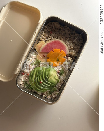 A traditional Korean dosirak, beautifully arranged with rice, assorted banchan, and savory proteins. Balanced and visually inviting, its a portable meal packed with vibrant flavors. 132359963