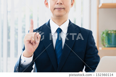 Businessman worried while looking at a computer 132360114