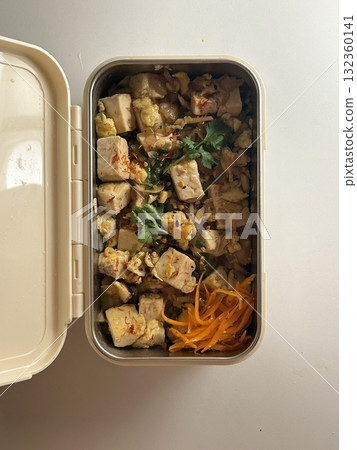 A traditional Korean dosirak, beautifully arranged with rice, assorted banchan, and savory proteins. Balanced and visually inviting, its a portable meal packed with vibrant flavors. 132360141