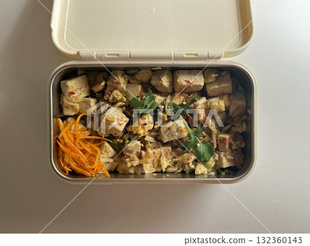 A traditional Korean dosirak, beautifully arranged with rice, assorted banchan, and savory proteins. Balanced and visually inviting, its a portable meal packed with vibrant flavors. 132360143