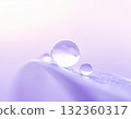 Water droplets falling on petals 132360317