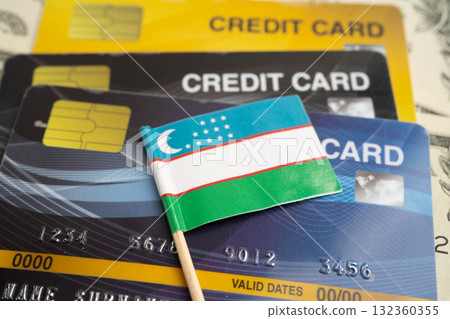 Uzbekistan flag on credit card, finance economy trading shopping online business. 132360355
