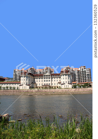 Takarazuka Hotel and apartment complexes seen from the opposite bank of the Mukogawa River 132360529