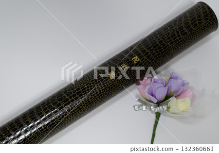 Diploma tube and corsage Diploma tube and corsage 132360661