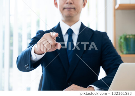 Businessman to point out 132361583
