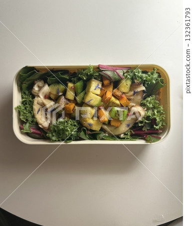 Colorful dosirak salad packed with fresh greens, vibrant veggies, and protein-rich toppings, offering a perfect balance of nutrition, crunch, and flavor in every light and refreshing bite. Colorful dosirak salad packed with fresh greens, vibrant veggies, and protein-rich toppings, offering a perfect balance of nutrition, crunch, and flavor in every light and refreshing bite. 132361793