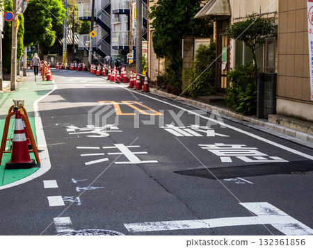 Road markings indicating school routes and school zones: "Caution: School" Road markings indicating school routes and school zones: "Caution: School" 132361856