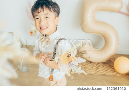 Boy being photographed at a Shichi-Go-San photo studio Boy being photographed at a Shichi-Go-San photo studio 132361910