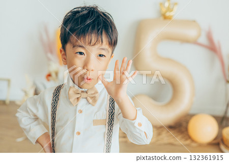 Boy being photographed at a Shichi-Go-San photo studio 132361915