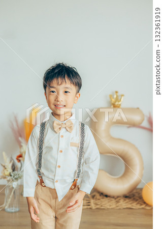 Boy being photographed at a Shichi-Go-San photo studio Boy being photographed at a Shichi-Go-San photo studio 132361919
