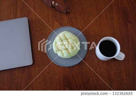 Melon Ppang, a fluffy Korean bread shaped like a melon with a crisp, sugary top layer. Popular for its sweet flavor and unique look, it's a delightful treat perfect for snacks or desserts. 132362685