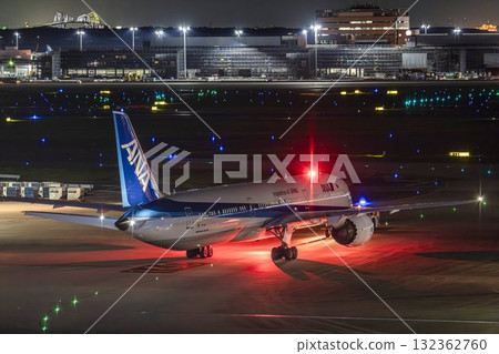 Haneda Airport at night, airplane taxiing, Ota Ward, Tokyo Haneda Airport at night, airplane taxiing, Ota Ward, Tokyo 132362760