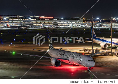 Haneda Airport at night, airplane taxiing, Ota Ward, Tokyo Haneda Airport at night, airplane taxiing, Ota Ward, Tokyo 132362761