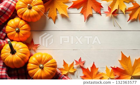 Warm autumn background showcasing pumpkins and colorful leaves, creating a festive and cozy fall ambiance 132363577