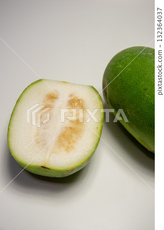Cut winter melon placed on a white background Cut winter melon placed on a white background 132364037