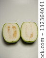 Cut winter melon placed on a white background 132364041