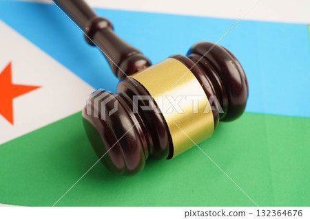 Djibouti law, Legal, justice and agreement, wooden court gavel on flag. Djibouti law, Legal, justice and agreement, wooden court gavel on flag. 132364676