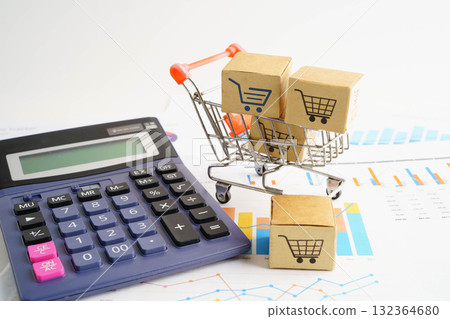 Online shopping, Shopping cart box on business graph, import export, finance commerce. 132364680