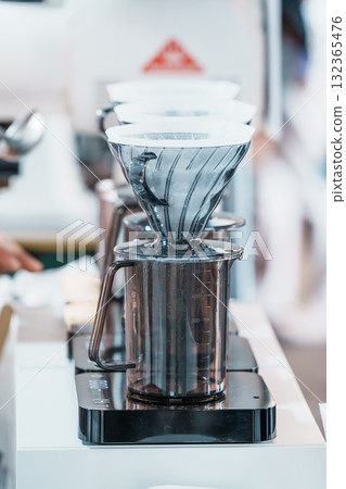 Close-up of fine coffee drip extraction 132365476