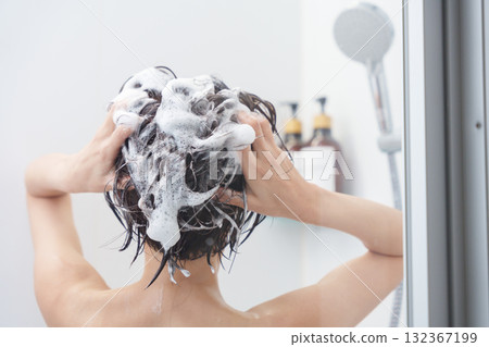 A woman shampooing in the bath (bathroom, shower, bathing) A woman shampooing in the bath (bathroom, shower, bathing) 132367199