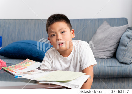 Elementary school boy learning Elementary school boy learning 132368127