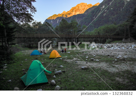 Autumn in the Northern Alps: The road to Karasawa Cirque, Yokoo Campground and Mount Maehotaka bathed in the glow of the morning glow 132368832