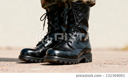 Military Combat Boots Standing at Attention Close-up 132369001